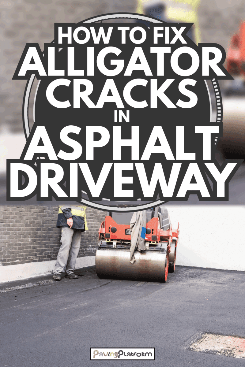 worker using an asphalt roller to keep everything well pressed. How To Fix Alligator Cracks In Asphalt Driveway
