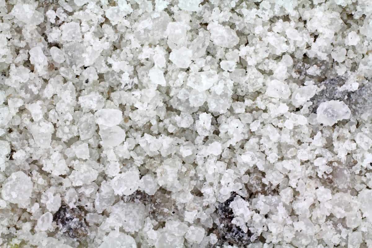 A very close view of rock salt used for melting ice on roads.

