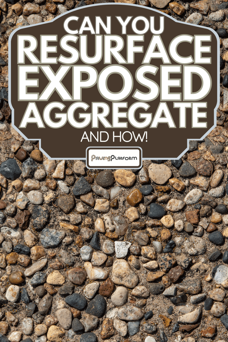 Vintage exposed aggregate stone patio surface in bright natural sunlight, Can You Resurface Exposed Aggregate [And How!]