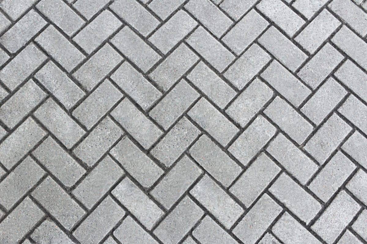 Diagonal concrete pavers photographed on top view