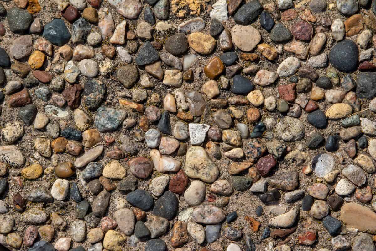 Exposed aggregate stone patio surface texture background