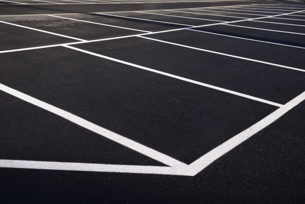 New, empty parking lot with freshly painted lines.