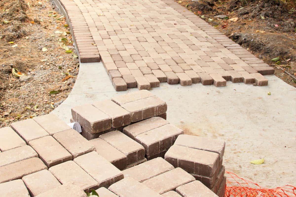 Paving a stone installation over concreate, Can You Put Pavers Over Concrete? [And How To]