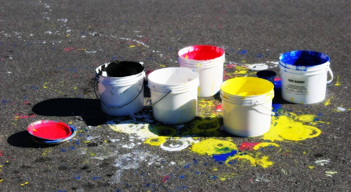 Street Artist Colorful Buckets