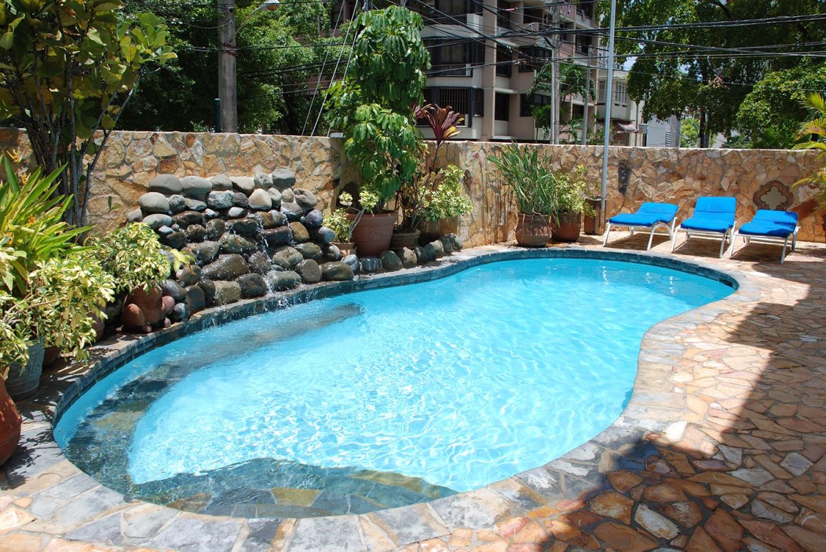 A hotel pool in a tropical location