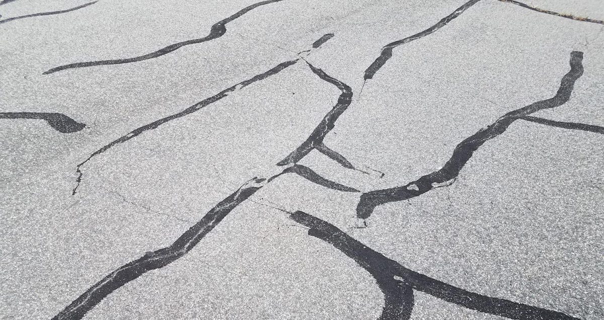 Black asphalt with tar to repair damaged
