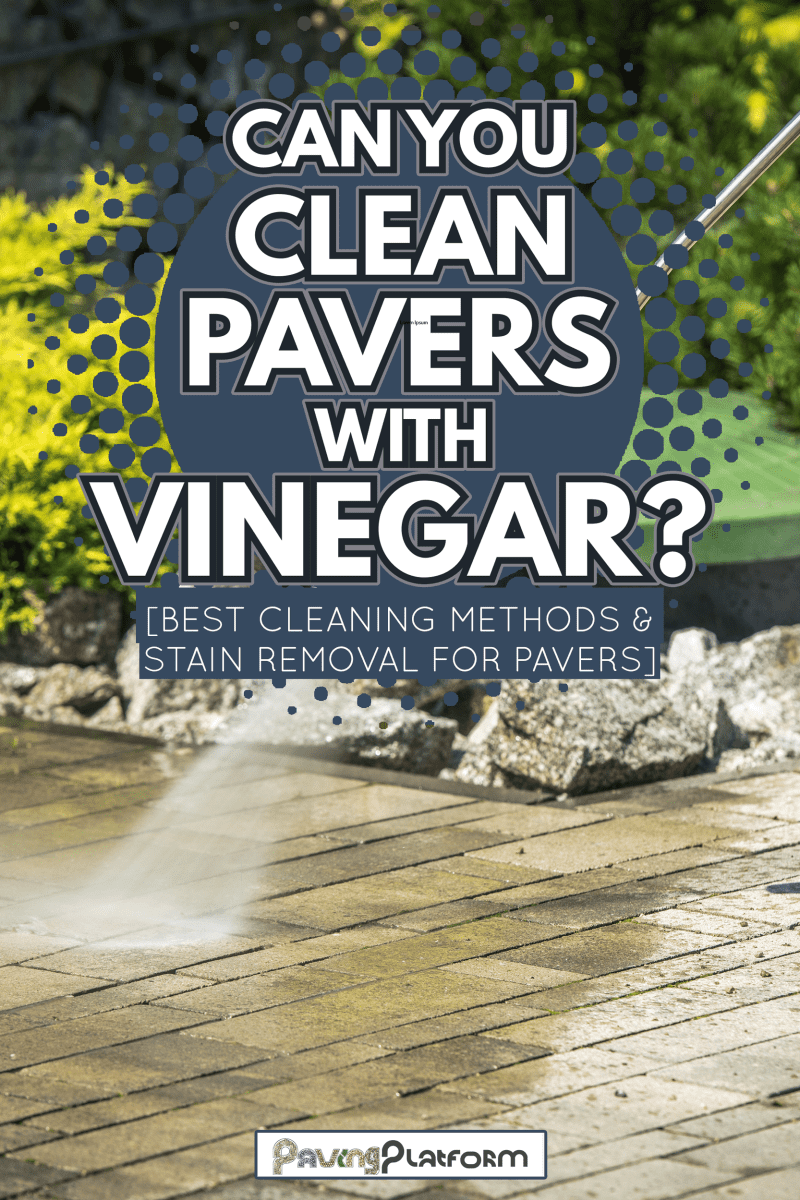 Cobble Brick Driveway Pressure Washing by Worker. - Can You Clean Pavers With Vinegar [Best Cleaning Methods & Stain Removal for Pavers]