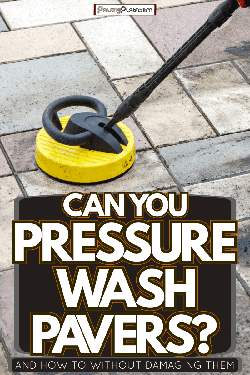 Man using a power sprayer to clean pavers, Can You Pressure Wash Pavers? [And How to Without Damaging Them]