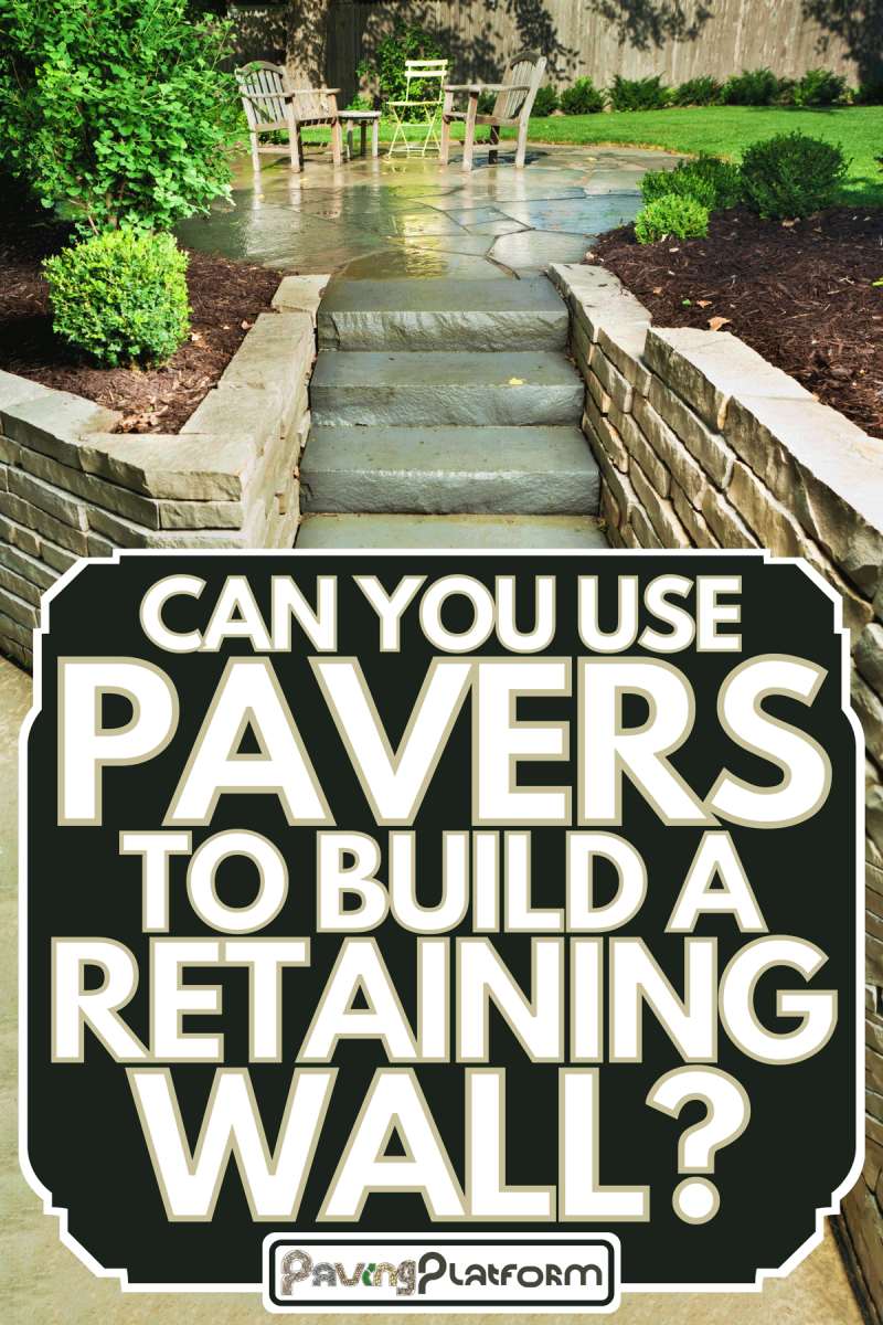 Beautiful landscaped back yard with outdoor patio furniture and ornamental gardens, Can You Use Pavers To Build A Retaining Wall?