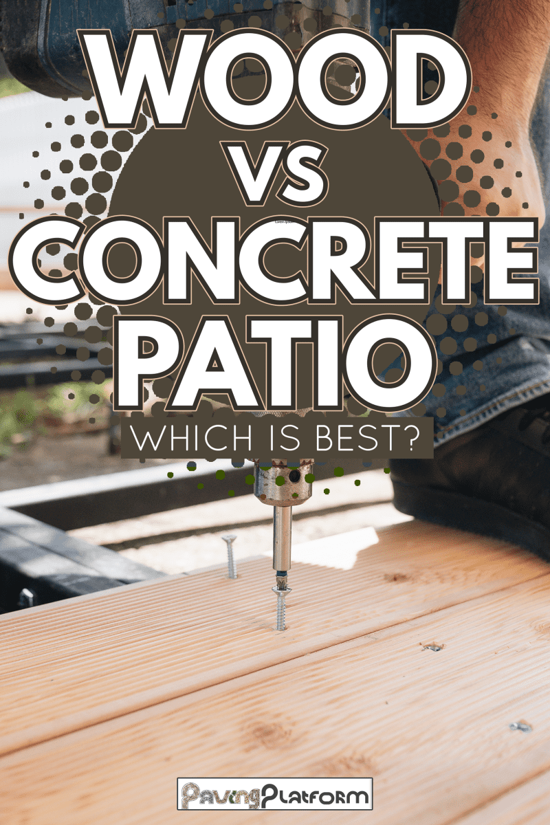 Carpenter installing a wood floor outdoor terrace in new house construction site - Wood Vs. Concrete Patio: Which is Best