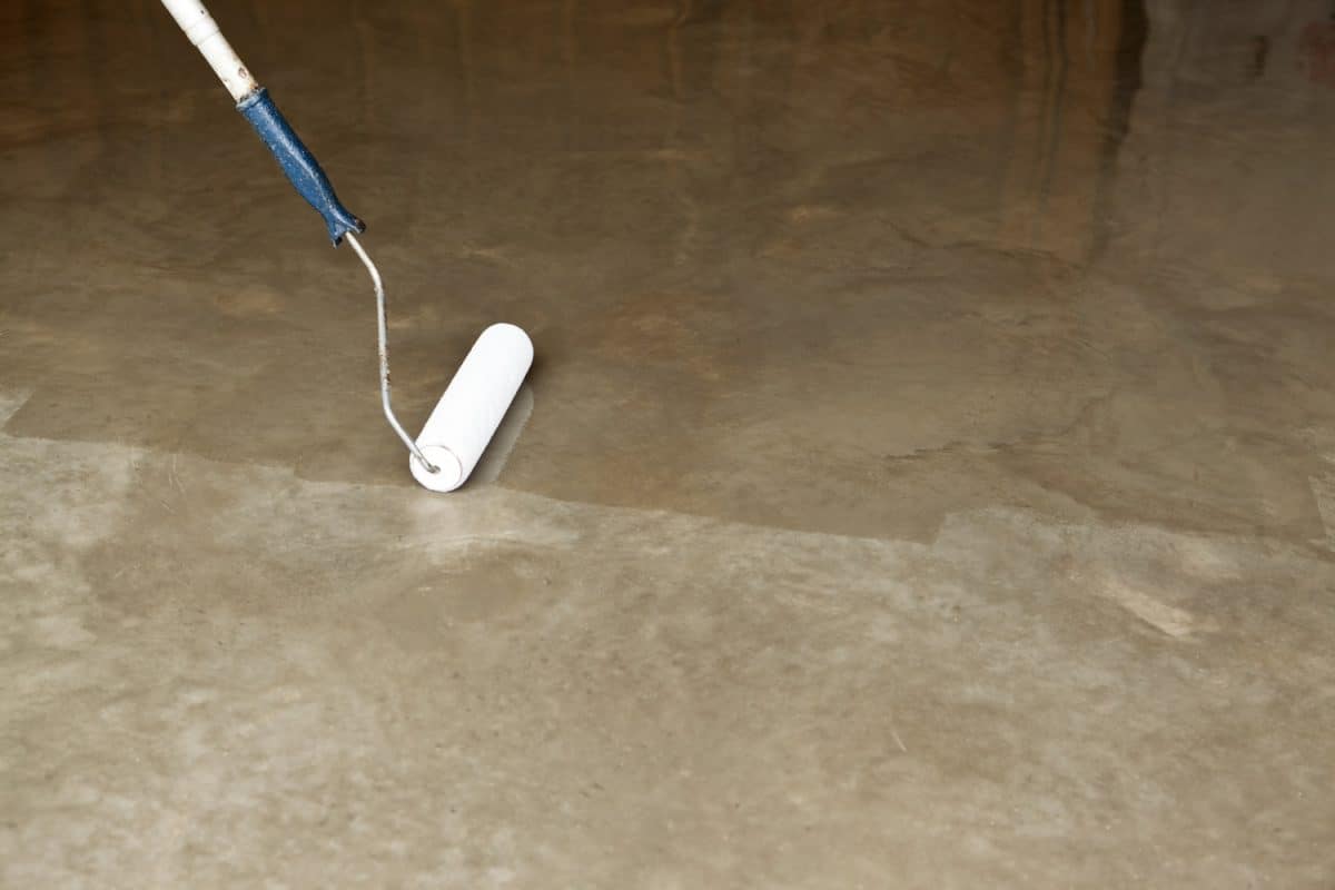 Clear Sealing New Concrete Floor with Paint Roller