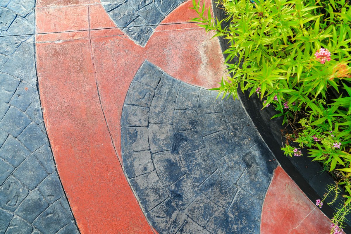 Colored stamped concrete pavers for the garden