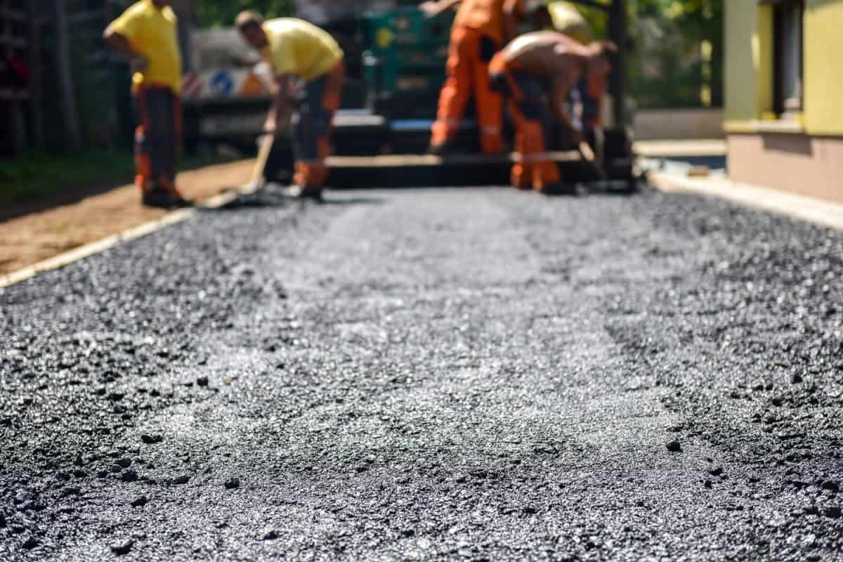 Constructing asphalt in private residence house driveway