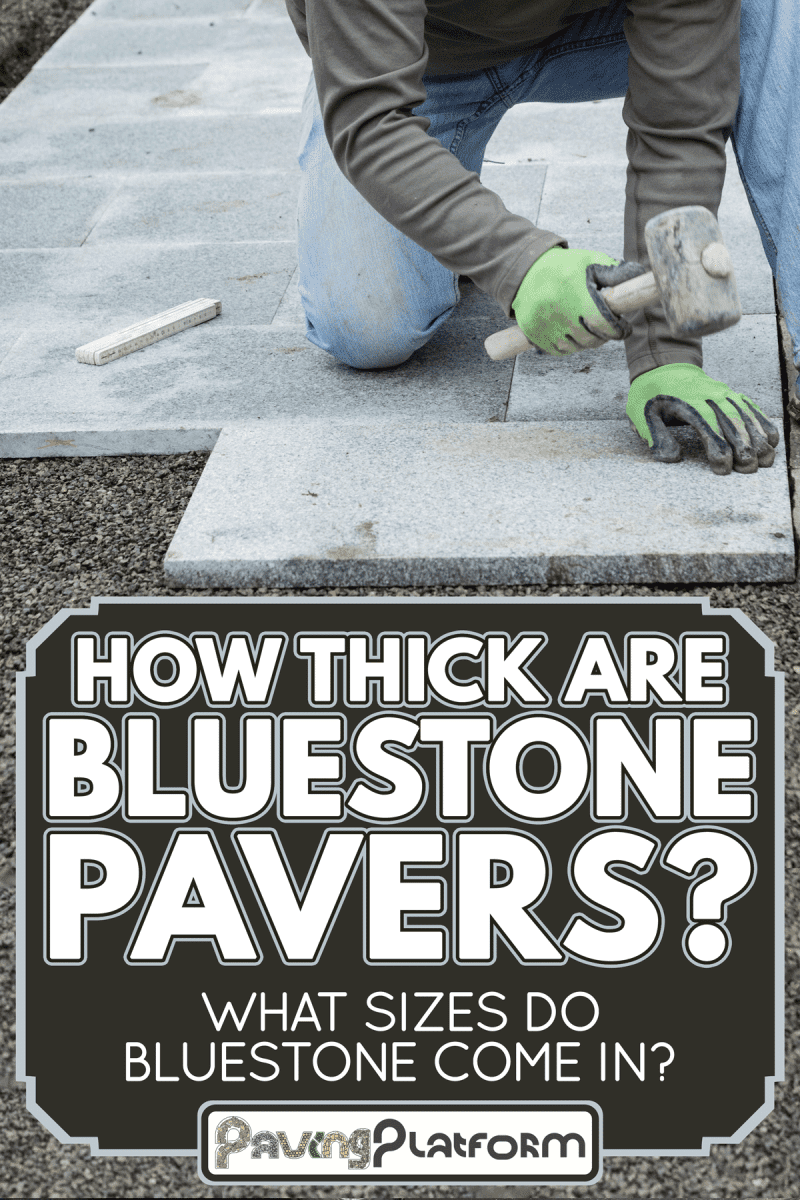 Worker hammering the stone plates to install in the walkway, How Thick Are Bluestone Pavers? [What Sizes Do Bluestone Come In?]