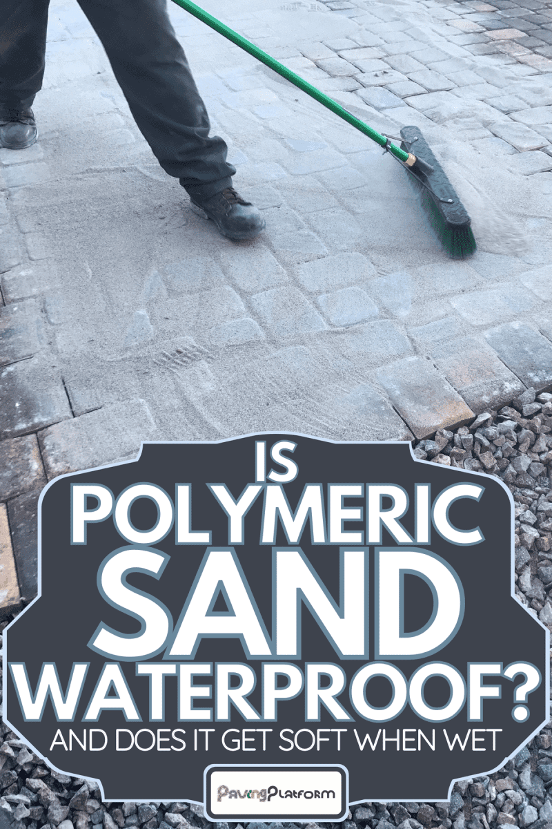 A worker spreads polymeric sand to the pavers, Is Polymeric Sand Waterproof? [And Does It Get Soft When Wet]