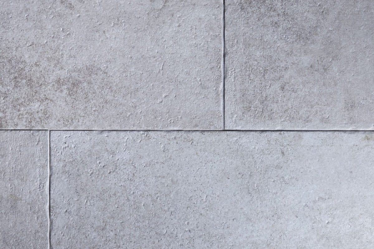 Light Grey Tumbled Porcelain Tile Texture with Stone Effect

