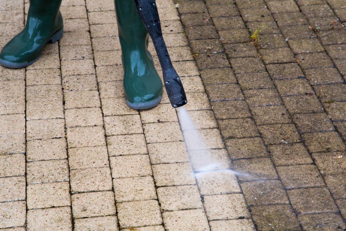 Outdoor floor cleaning with high pressure water jet
