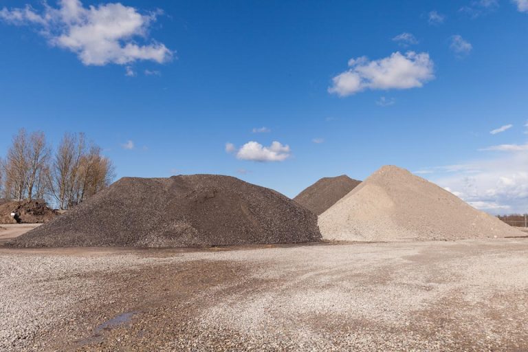 A piles of gravel and stone dust at construction site, Can You Use Stone Dust Between Pavers?