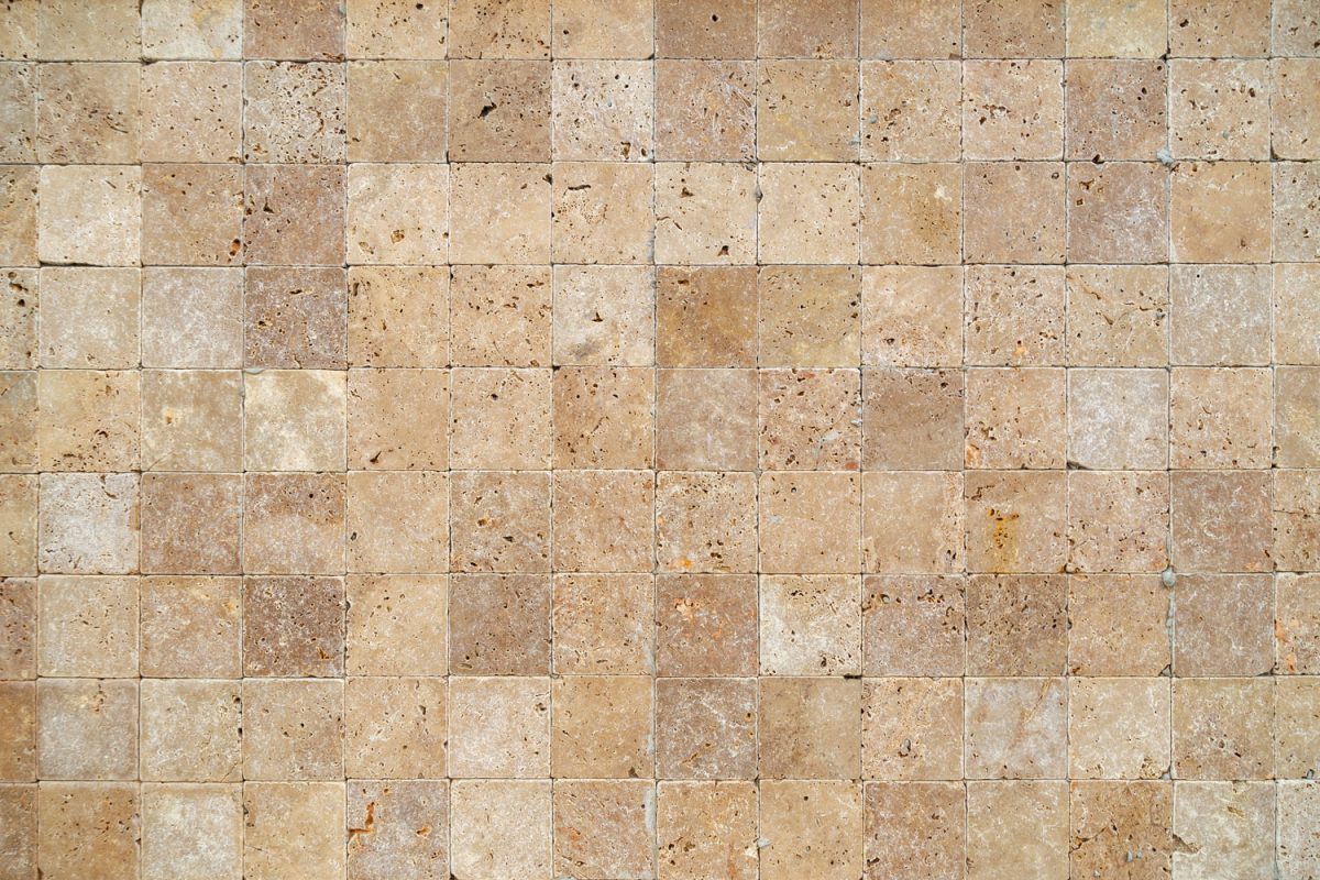 Small proportionate tile travertine used as pavers