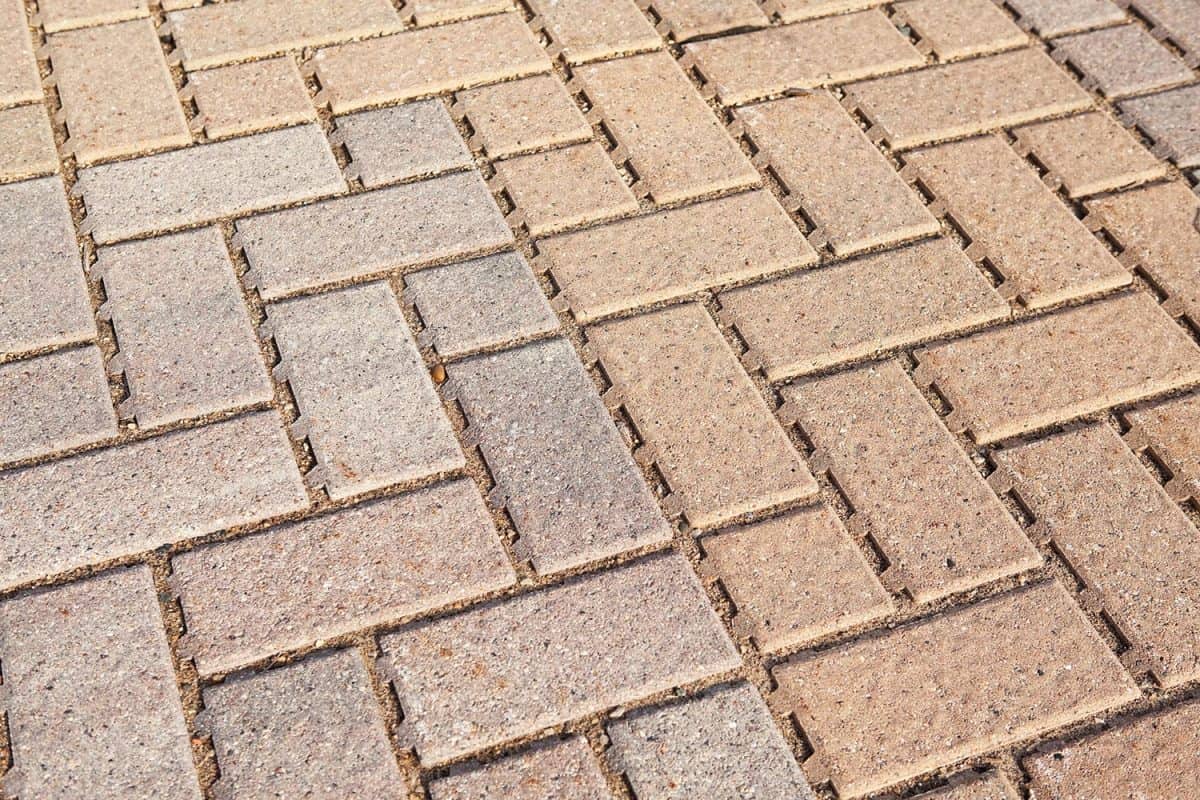 Space between the bricks is filled with sand to allow water to flow into the ground