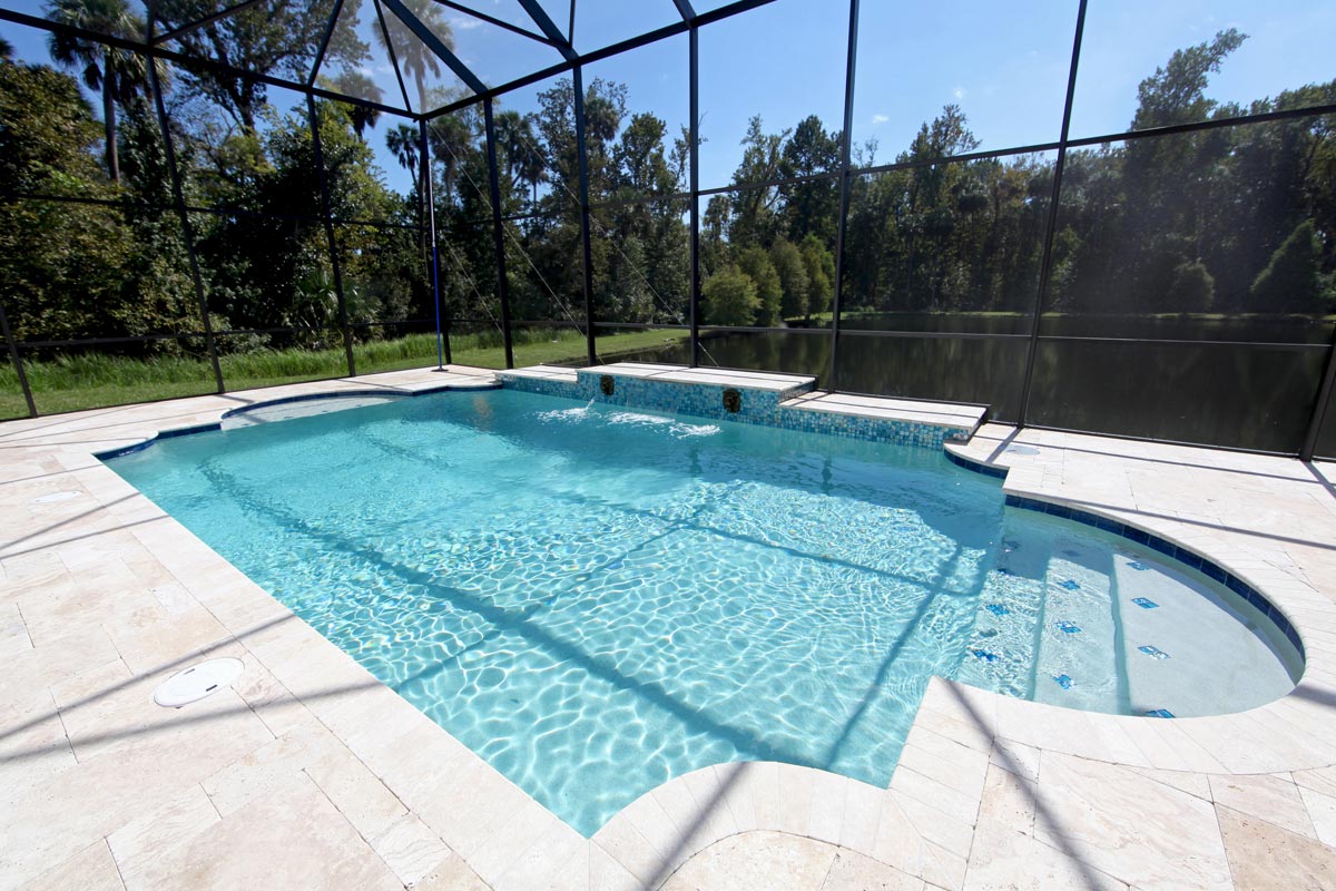 A swimming pool with lake view, Are Porcelain Pavers Good For Pool Decks?