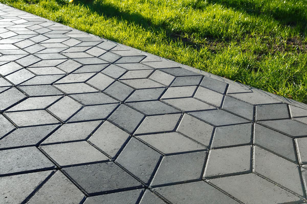 The footpath in the park is paved with diamond shaped concrete paver, Should There Be A Gap Between Concrete Pavers?