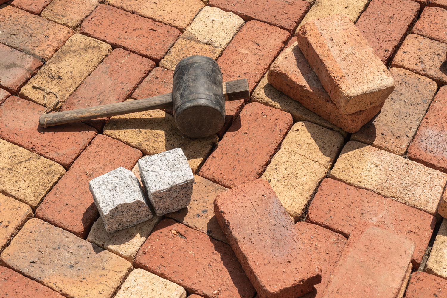 Tool for brick flooring