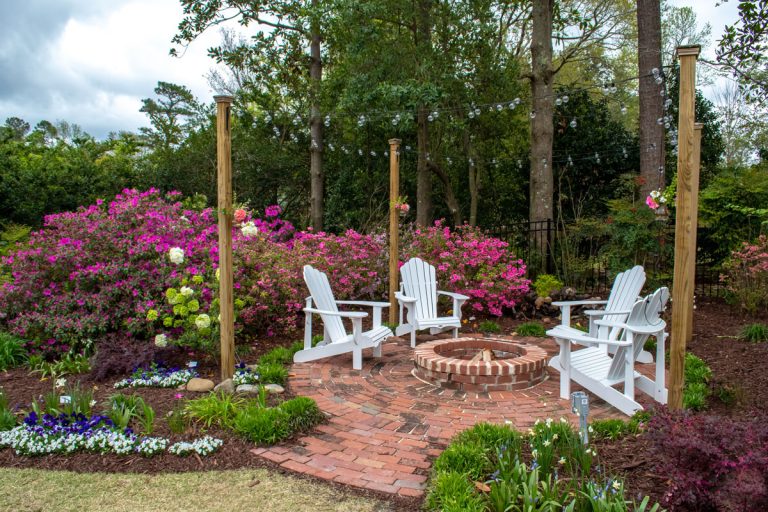 Welcome Spring and Summer with gardens designed for entertaining. Landscaped home design, small fairy gardens, painters get inspiration among the flowers, Are Pavers Safe For A Fire Pit? [With 2 Types Of Fire Pit Pavers]