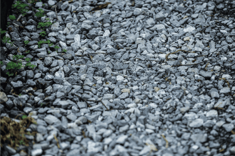 crushed rocks and stones used as pathway pavers. Does Stone Dust Absorb Water [And Is It Good For Drainage]