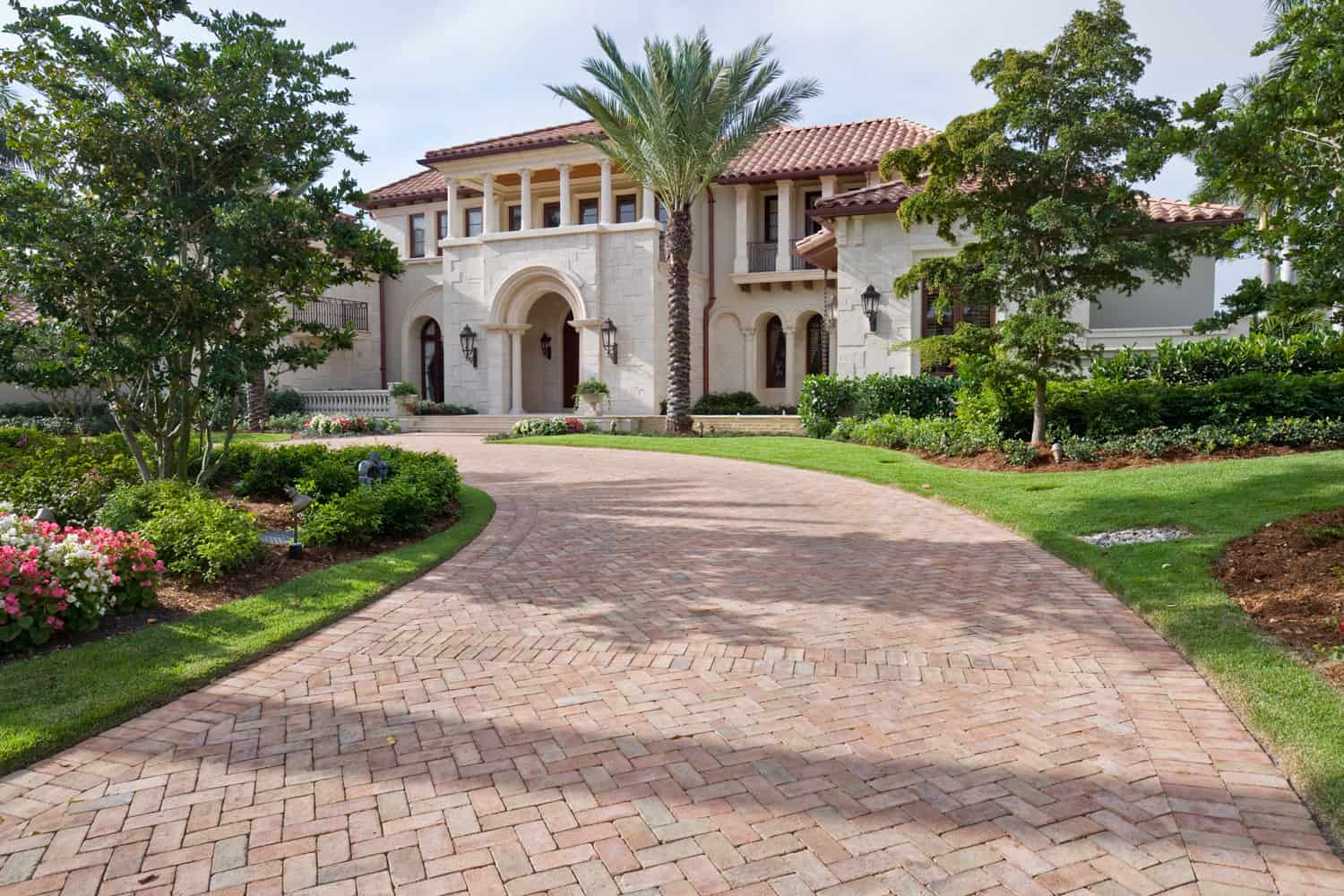 Brick pavers leading up to this beautiful estate home in Florida.