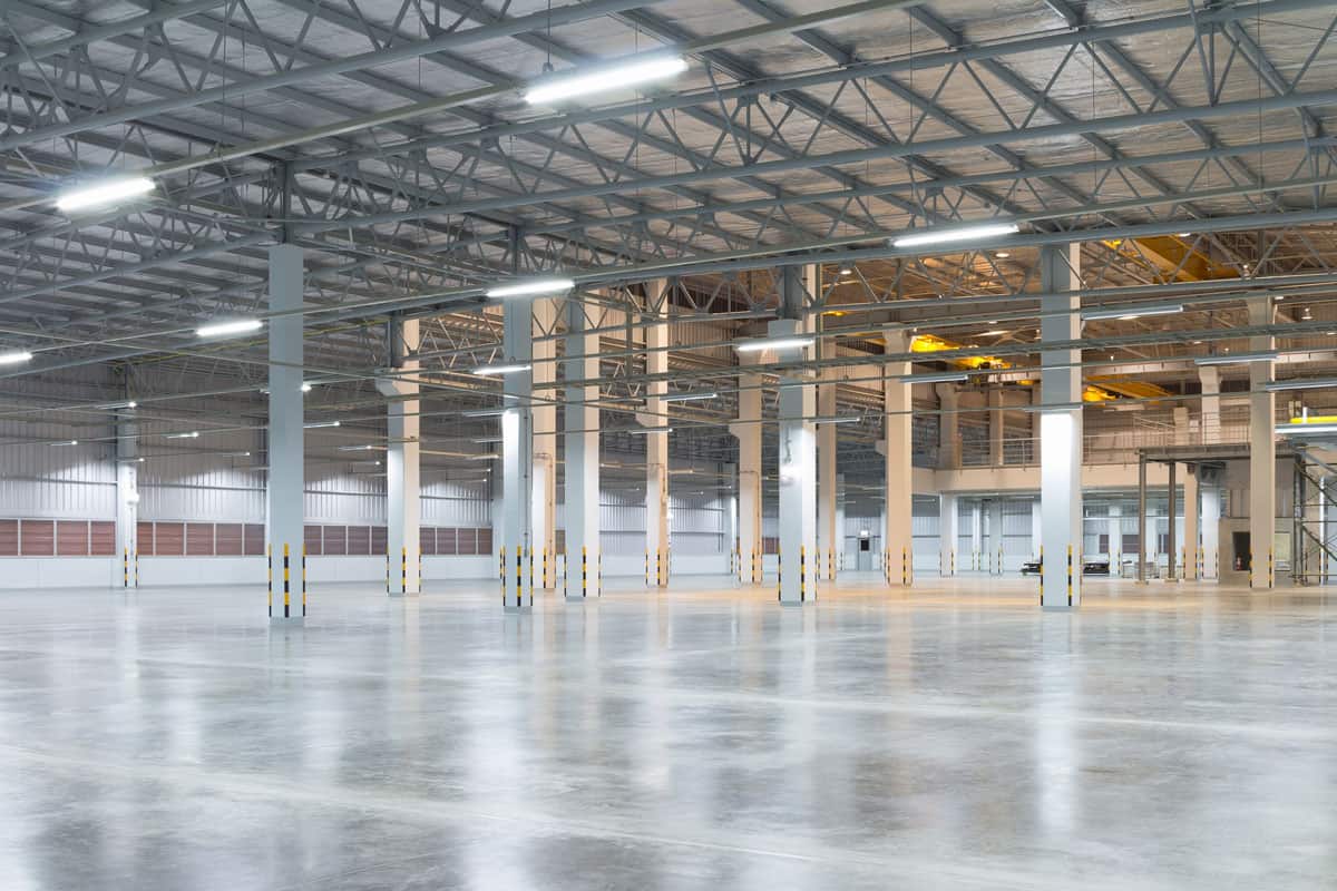 Empty factory building or warehouse building with concrete floor