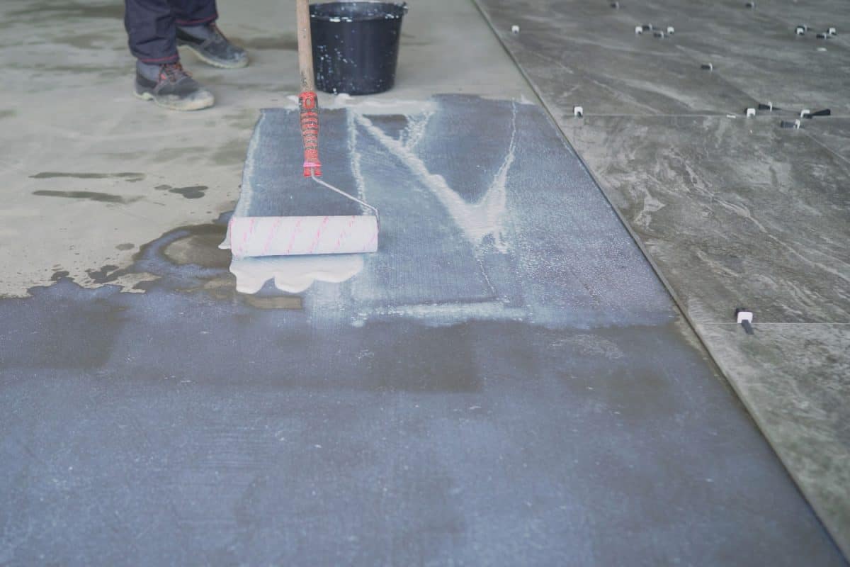 Large scale application of a primer to concrete floors.
