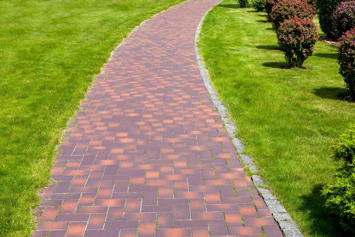 Properly laid out red pavers for a garden